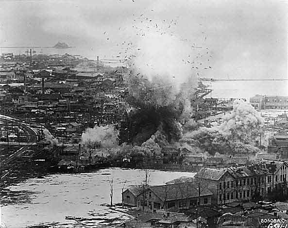 Costly Visit - Immediate explosion from a direct hit made by a B-26 Invader light bomber on a church containing Communist high explosives - March 1951.