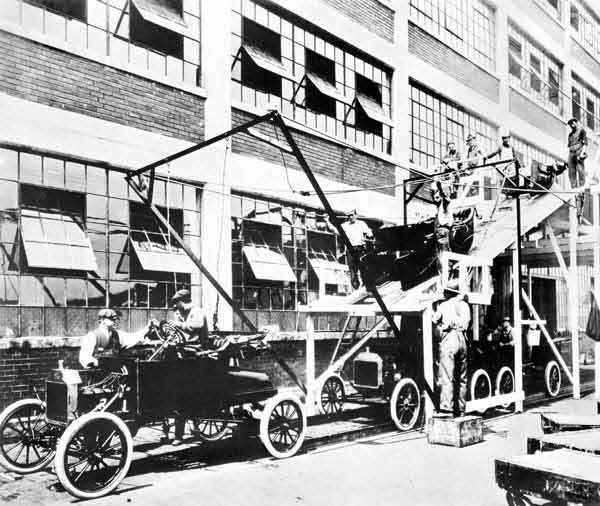 First Ford Assembly Line, 1913. Ford Motor Company Factory - Dearborn, Michigan.