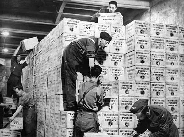 Cases of TNT gunpowder shipped from the USA under lend-lease are stacked in the dump.