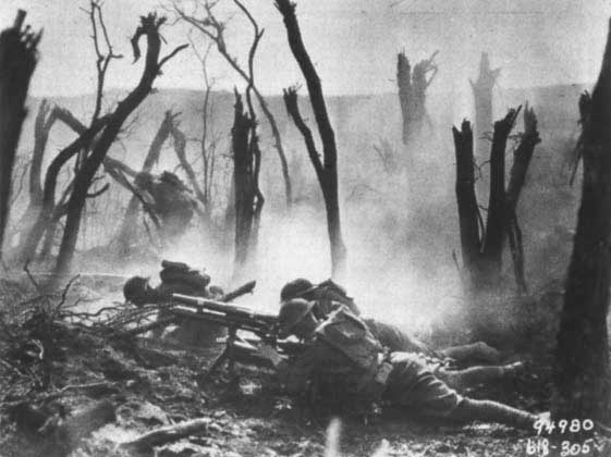 Gun crew from regimental headquarters company, 23rd Infantry, firing a 37mm gun.