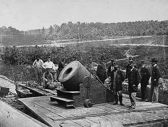 The Siege of Yorktown, Virginia. Immense batteries of enormous guns and mortars were planted all along the line by the First Connecticut Heavy Artillery. This is a battery of 13-inch sea-coast mortars. April 1862.