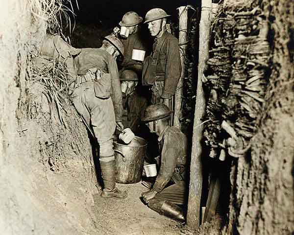 Serving coffee in the trenches during drills.